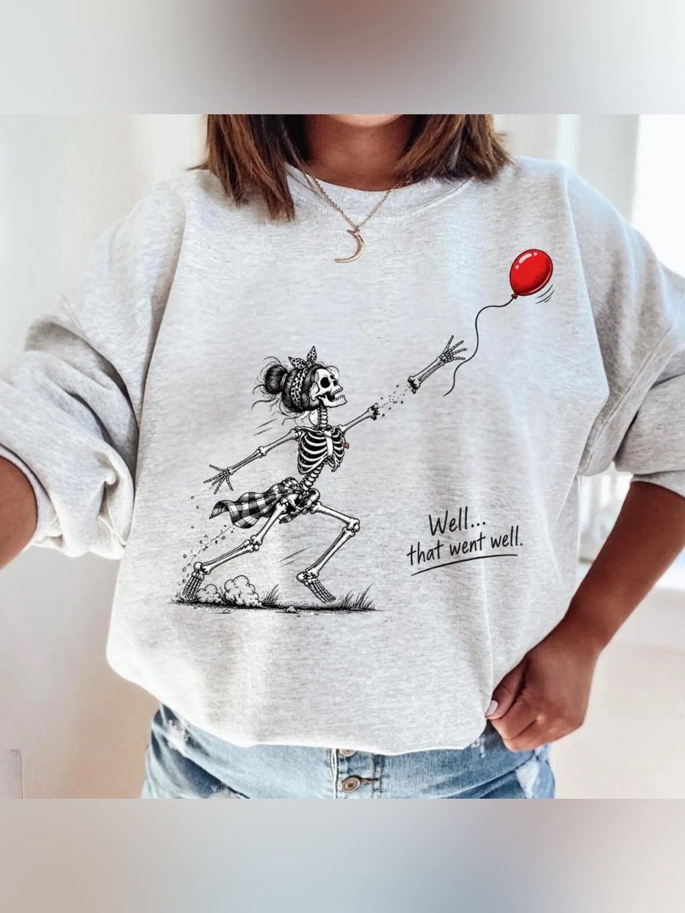 Ashgrey Women's Skeleton Balloon Graphic Sweatshirt with Red Accent